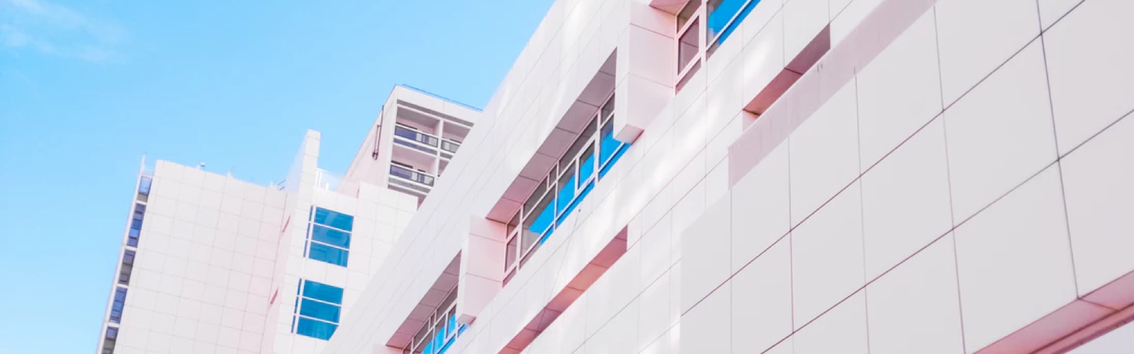 A picture of the top of an office building.