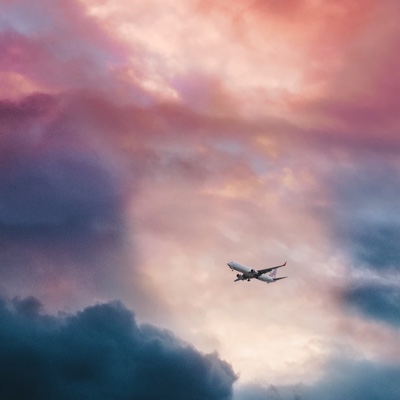 An airplane in operation in a gloomy weather.